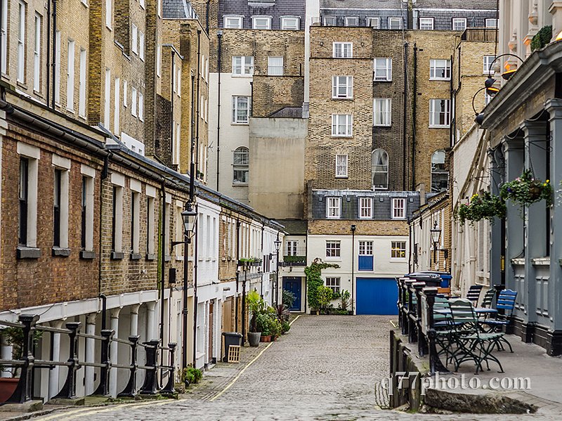 narrow passage to the streets with buildings low-rise buildings,