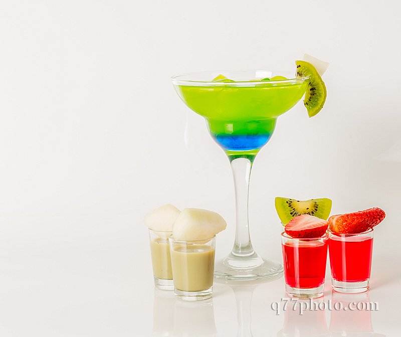 Colorful drink in a margarita glass, blue and green combination,