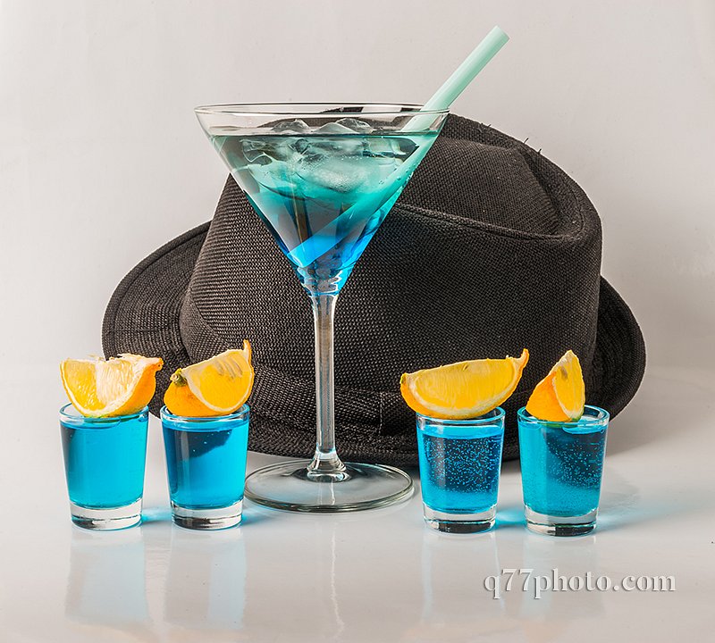 Colorful drink in a martini glass, blue and green combination, f