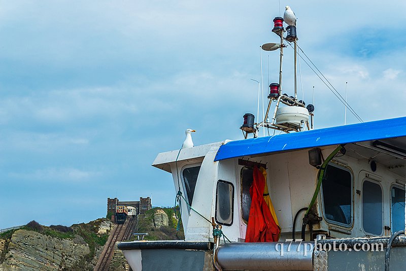 Fishing boats on the shore, pebble beach, wooden boats, fishing 