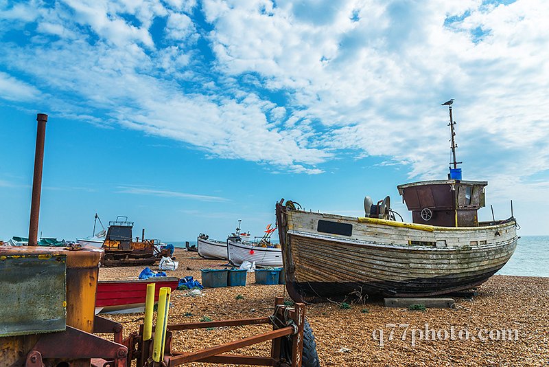 Fishing boats on the shore, pebble beach, wooden boats, fishing 