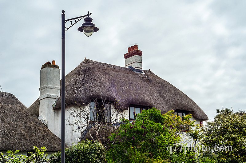 Interesting structure of roofs of rural buildings, roofs covered